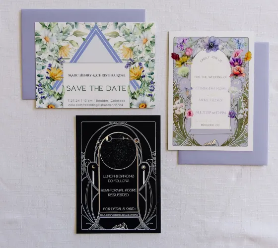 Wedding stationery suite: wildflower save-the-date, art-nouveau invitation and a black star-map details card
